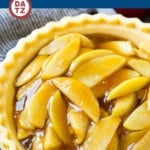 An image of apple pie filling which is made with sliced Granny Smith apples, brown sugar, spices and butter, all simmered together until thickened.