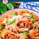This pasta pomodoro recipe is spaghetti tossed in a homemade tomato sauce and garnished with plenty of parmesan cheese and fresh basil.