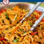 A pan of yakisoba noodles with chicken.