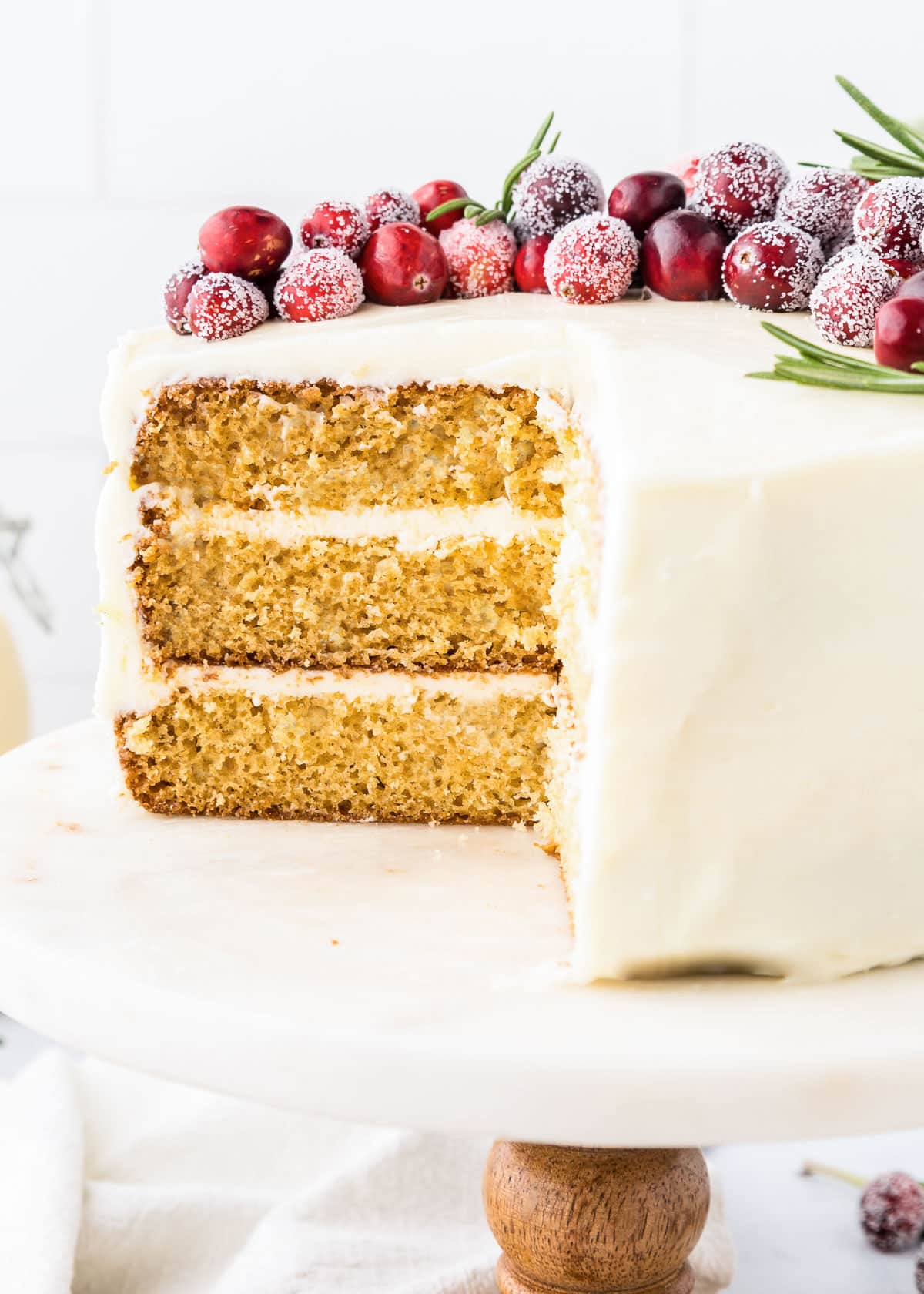 An eggnog layer cake cut open.