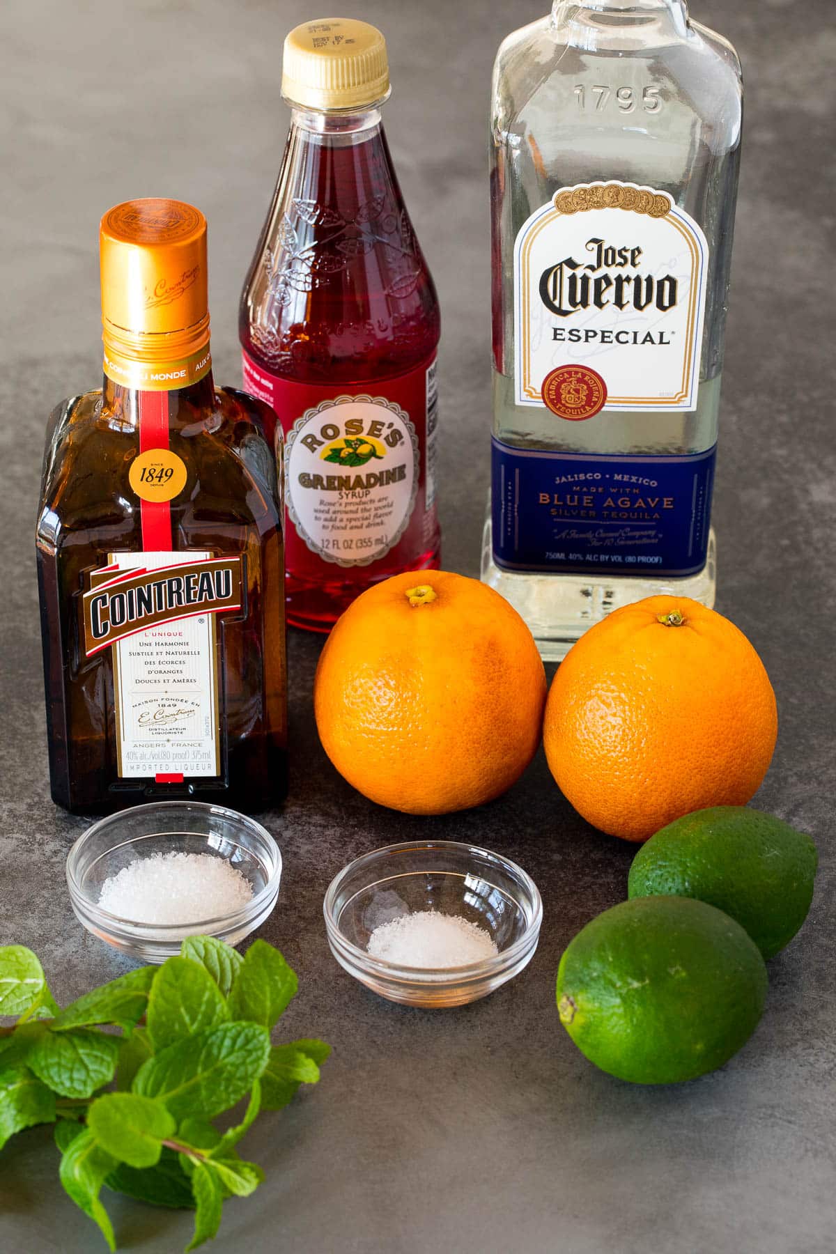 Ingredients including liquor, citrus, salt, sugar and mint.