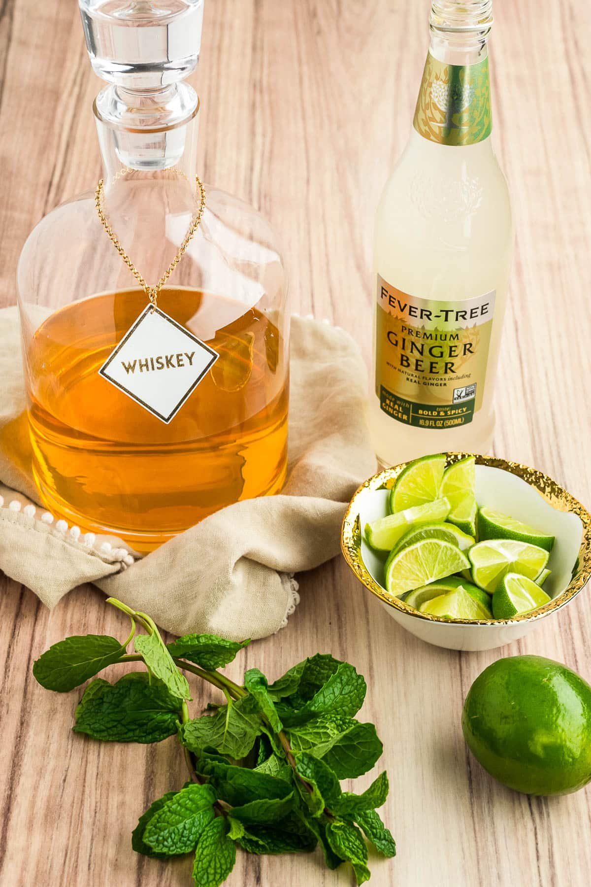 Whiskey, ginger beer limes and mint.