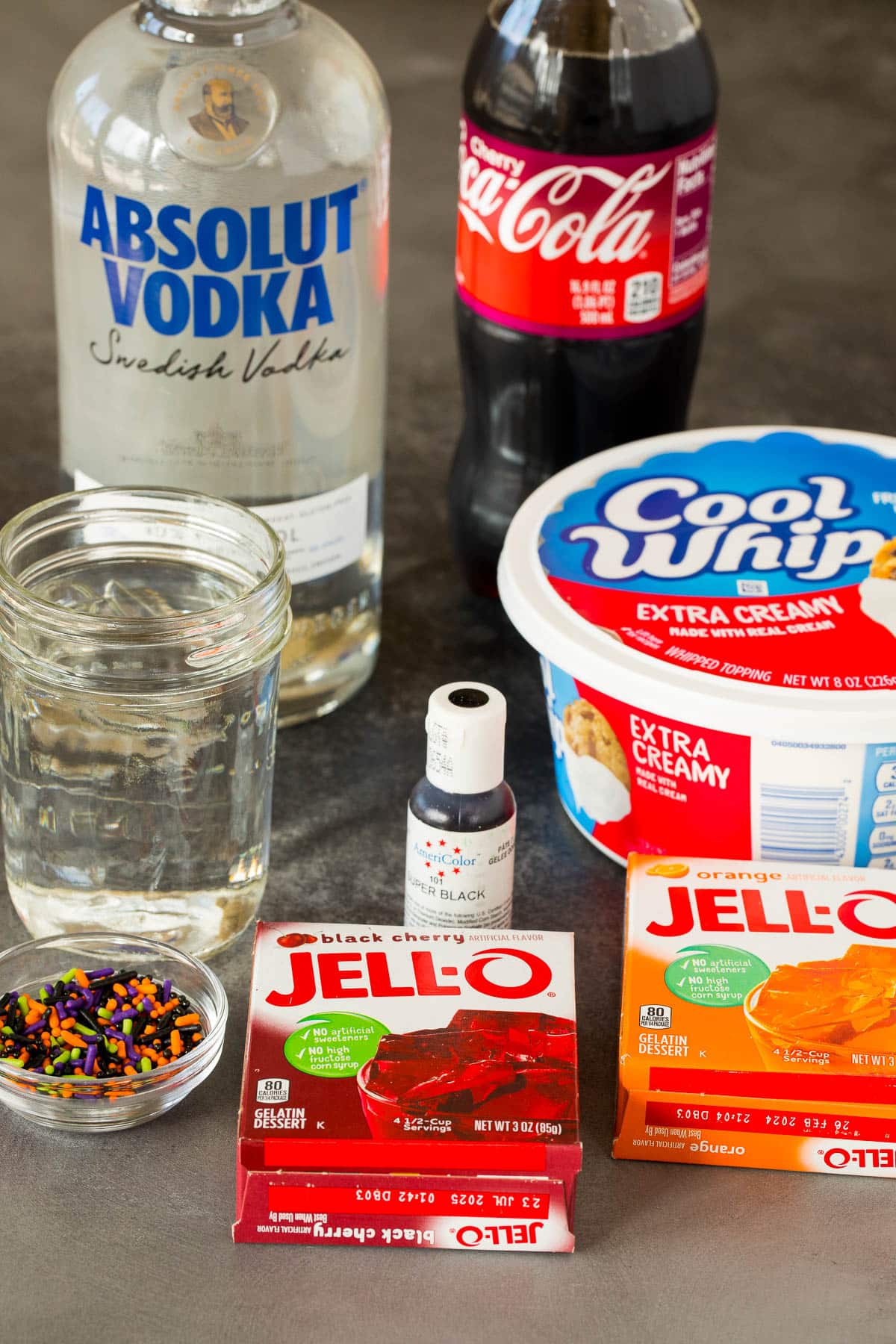 Ingredients including Jello, vodka, cherry coke and whipped topping.