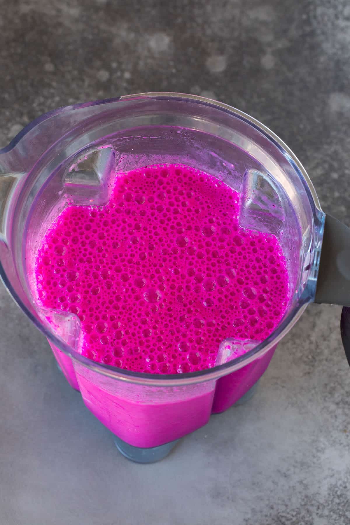 A smoothie mixed in a blender.