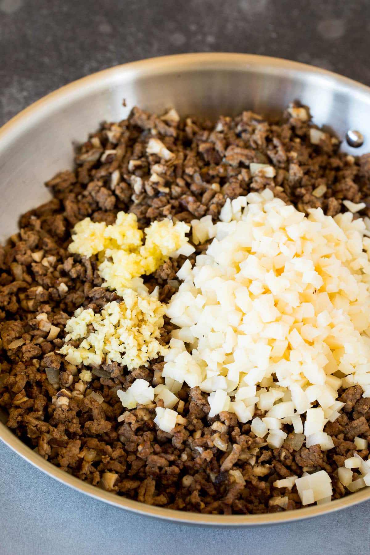 Grund beef with water chestnuts, garlic and ginger on top.