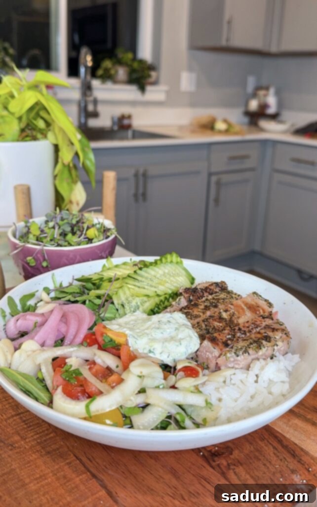 Copycat Cava bowl with date balsamic vinaigrette, hummus, and tzatziki.