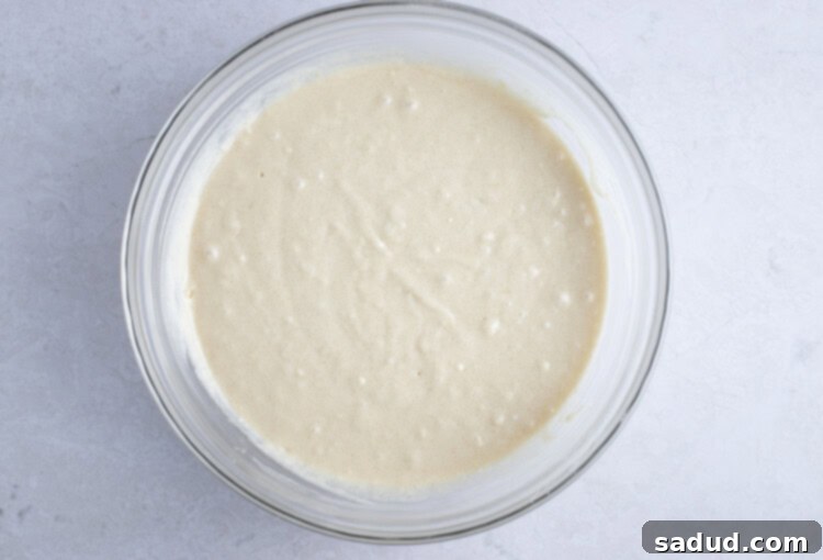 Coffee cake batter in large glass bowl