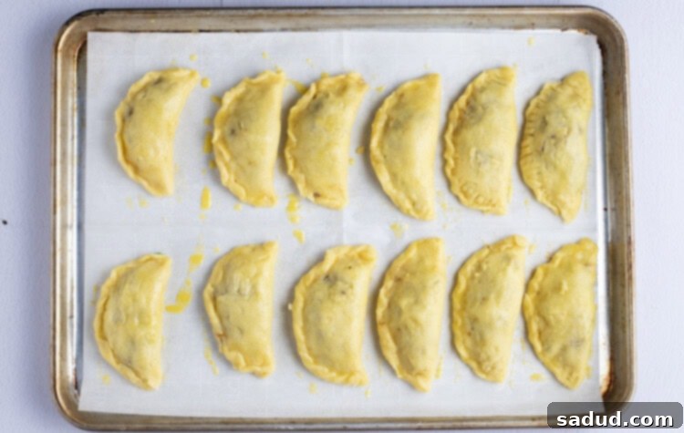 Keto empanadas on a baking sheet