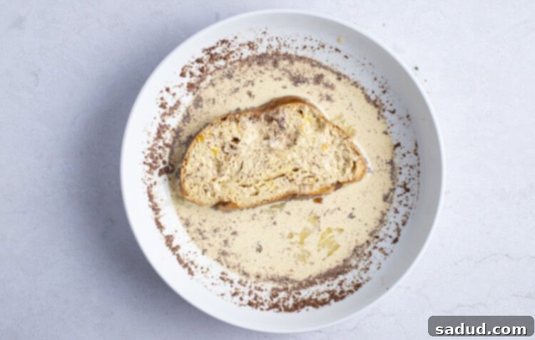 Bread in egg wash for air fryer french toast