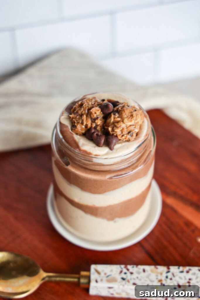 Close-up of the layered Chocolate Peanut Butter Mousse Chia Pudding, showing the creamy texture.