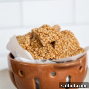 A bowl of delicious 2-Ingredient Honey Sesame Seed Candy, ready to be enjoyed as a healthy, homemade treat.