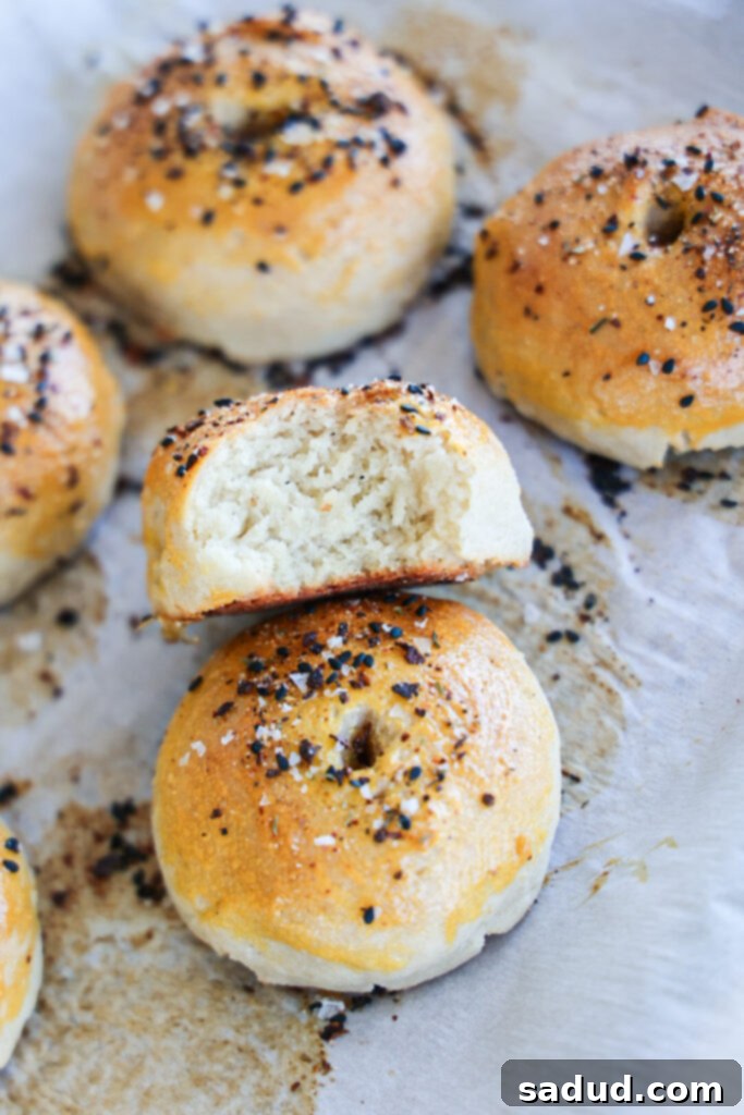 Close-up of freshly baked gluten-free, paleo bagels with seasoning.