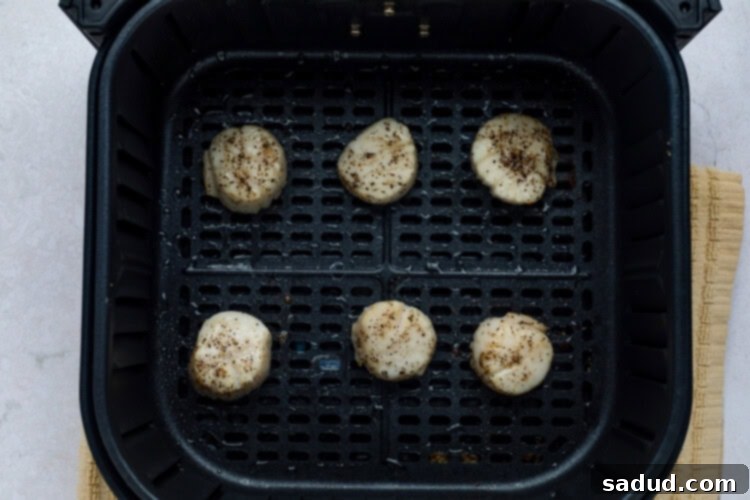 Step 3: Air fry scallops until golden and serve with lemon.