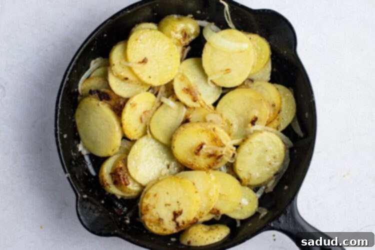 Smothered potatoes in large skillet