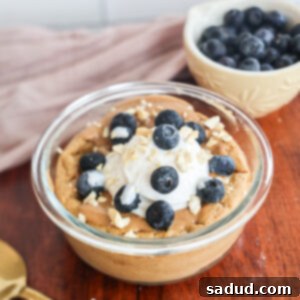 High Protein Pancake Bowl with berries and drizzle