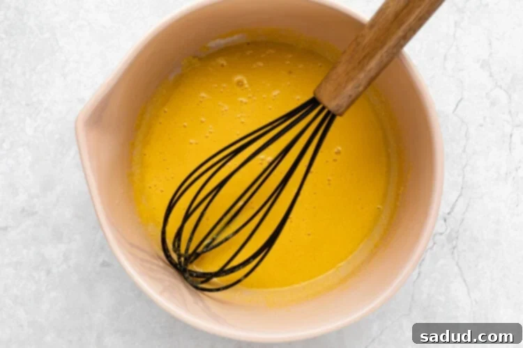 whisking egg yolks and sugar-free sweetener for keto creme brulee