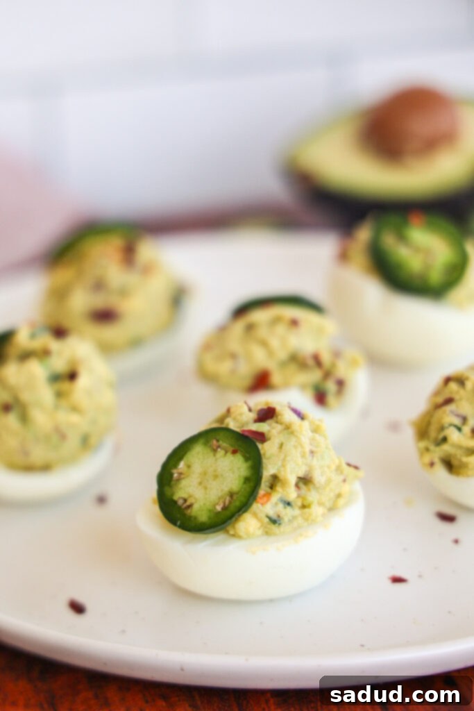 Guacamole avocado Deviled Eggs without mayo – a healthy, vibrant appetizer.