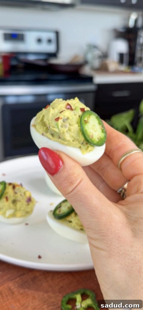 Guacamole avocado Deviled Eggs without dairy or mayo, fresh and vibrant.