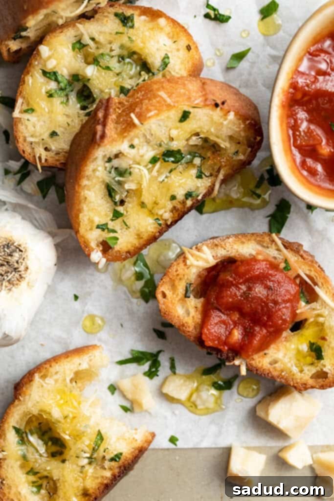 overhead image of vegan garlic bread with marinara sauce