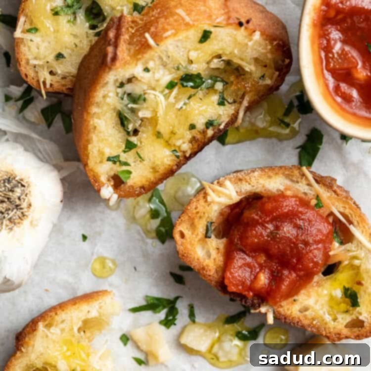 overhead image of vegan garlic bread with marinara sauce