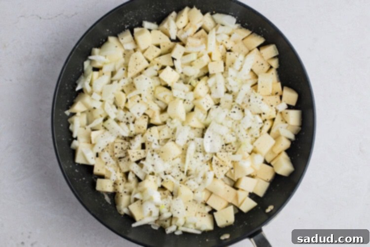 Dixie Skillet Spuds 6 Potatoes and onions in large skillet