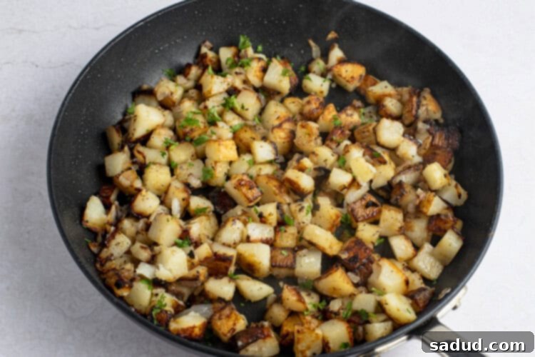 Dixie Skillet Spuds 8 Pan-fried potatoes and onions in large cast iron skillet