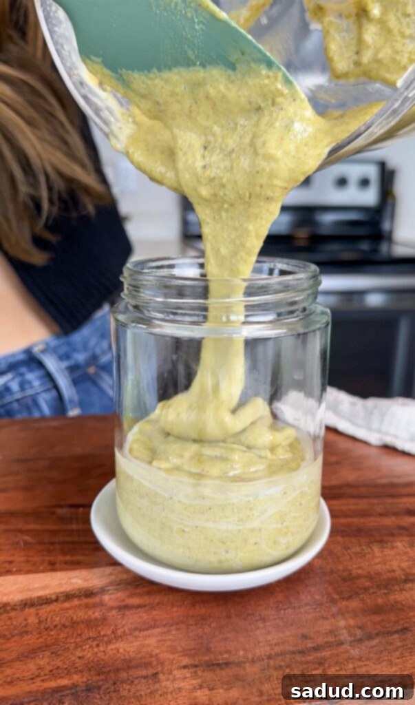 Blended pistachio cream in a food processor, showing smooth texture
