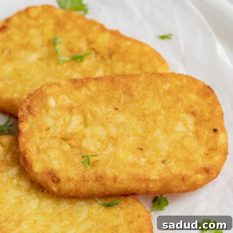 Crispy hashbrowns in the air fryer, golden brown and ready to serve.