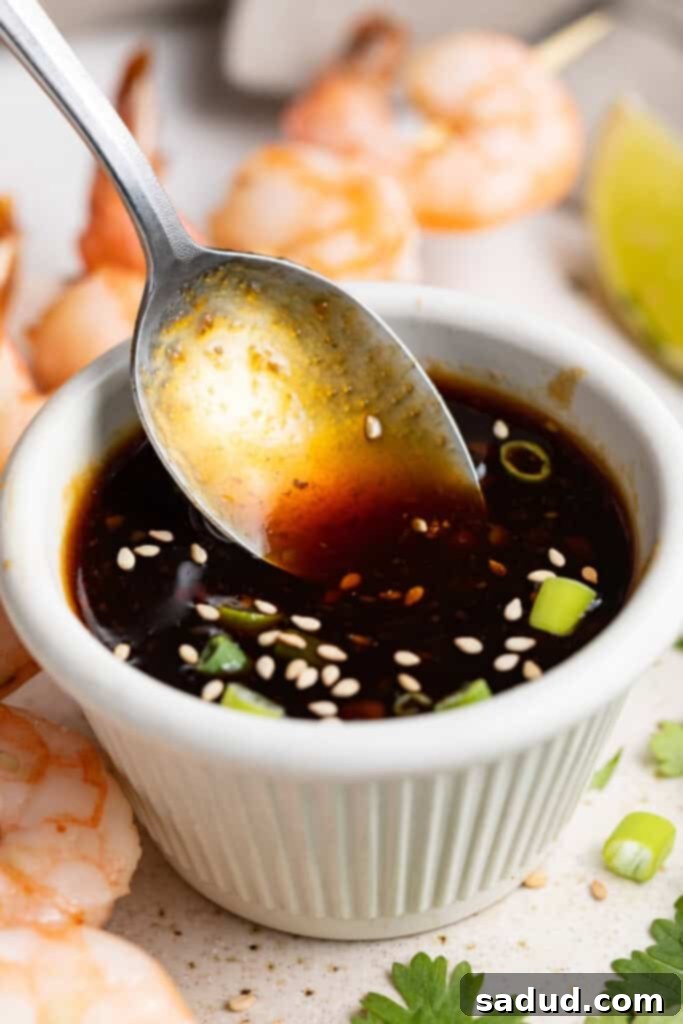 keto teriyaki sauce in a dish with a spoon