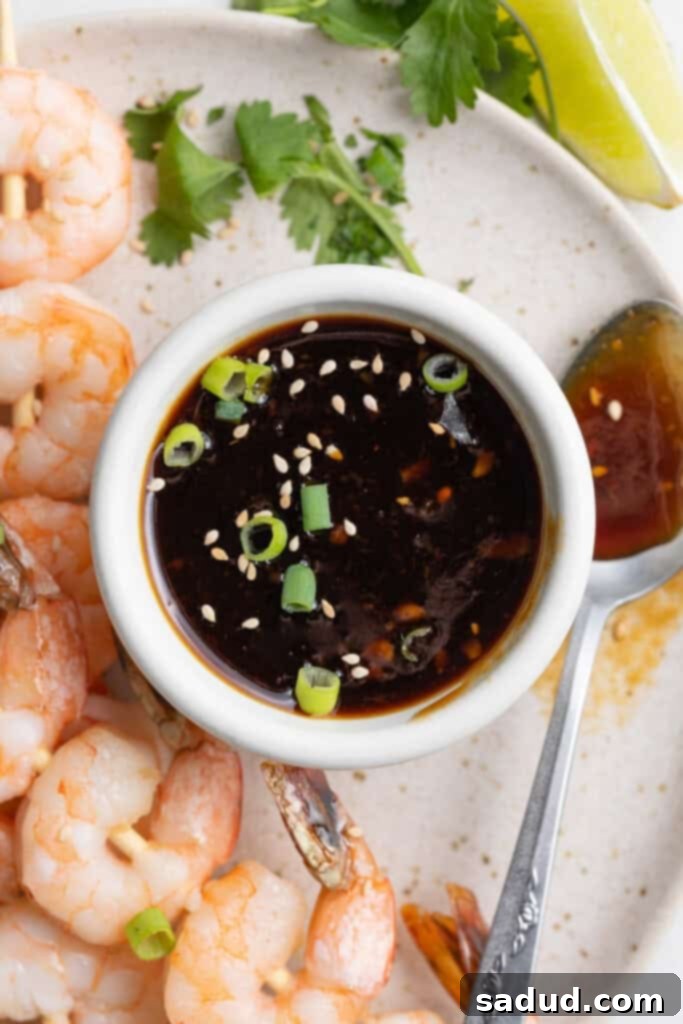 keto teriyaki sauce in a dish with shrimp on the side