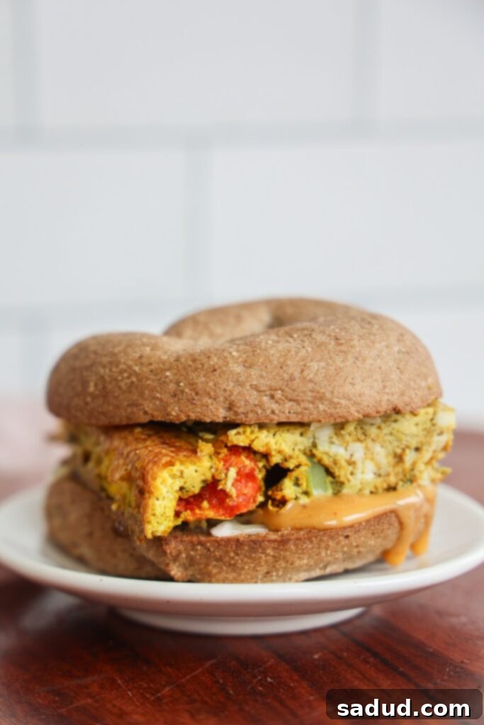 meal prep sheet pan eggs turned into a breakfast sandwich.