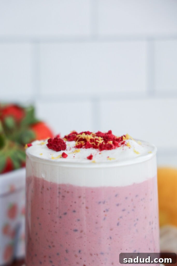 Creamy Raspberry Lemon Chia Pudding in a glass jar, ready to eat.