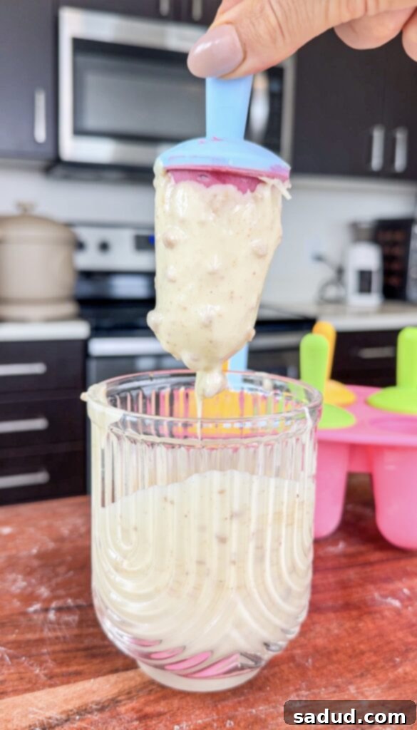 White Chocolate Coated Raspberry Yogurt Popsicles