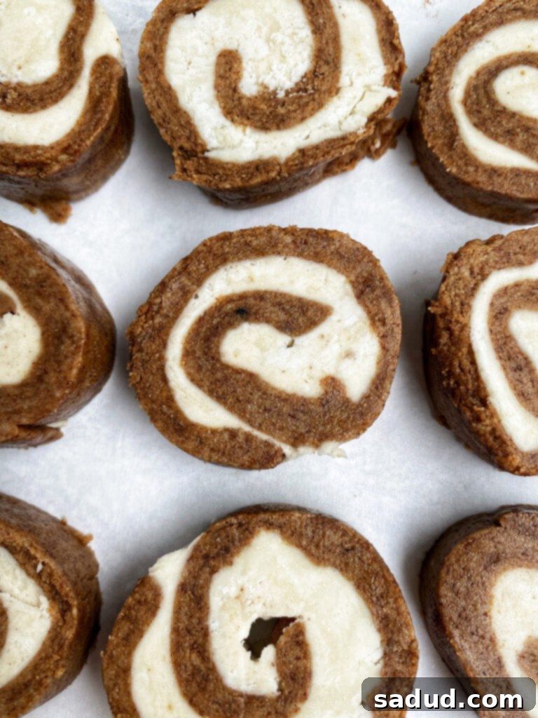 A tray of beautifully arranged no-bake cake rolls, showcasing their festive and inviting appearance.