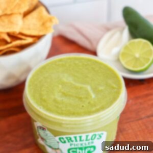 Dill Pickle Salsa served in a bowl with a spoon