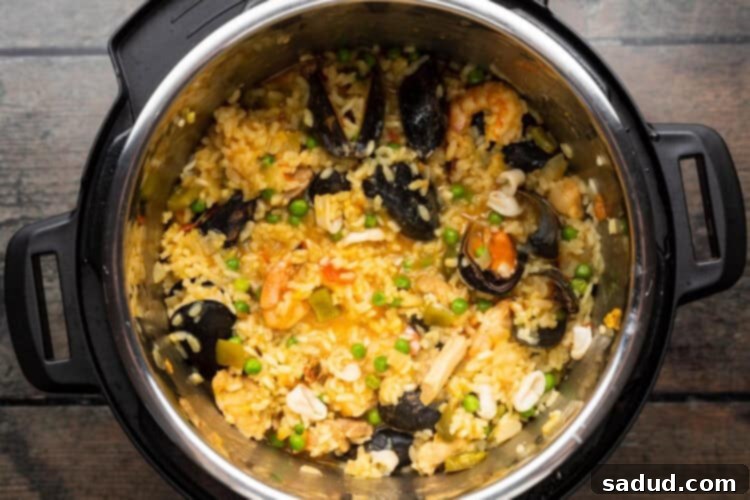 Overhead view of cooked Instant Pot paella, ready to be served.