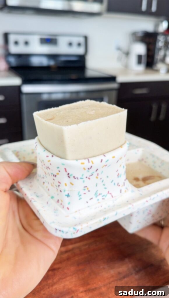 Individual ice cream cups with vanilla base.