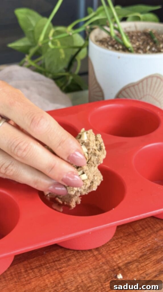 Step-by-step process of making the healthy strawberry shortcake cups, showing the cookie dough base.