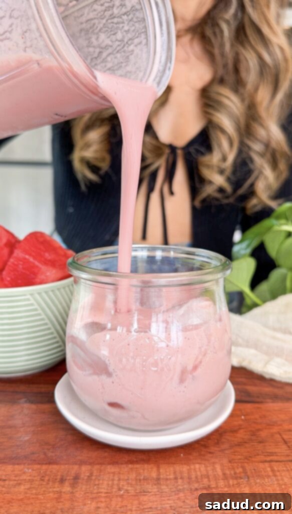 A bowl of creamy vanilla yogurt, emphasizing its rich texture and readiness for smoothie preparation.