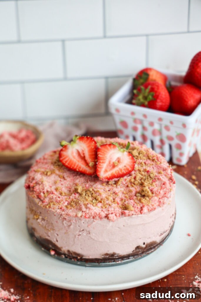 Vegan Strawberry Cheesecake (no-bake) slice with fresh strawberries