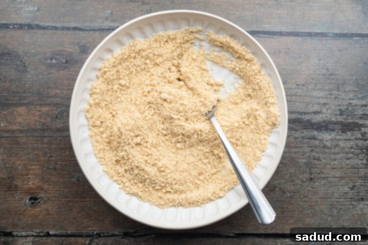 Overhead view of almond flour parmesan breading mixture for keto chicken nuggets.