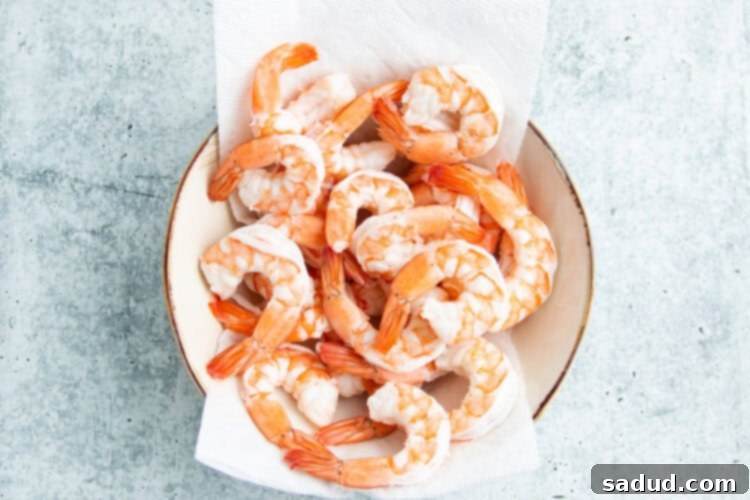 Poached shrimp in bowl.