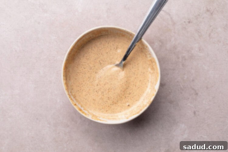 Chipotle aioli in small mixing bowl.