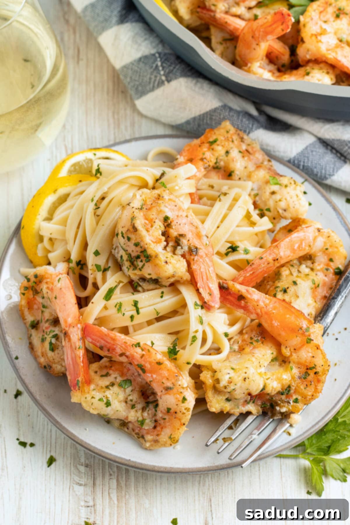 Shrimp francese on a plate.
