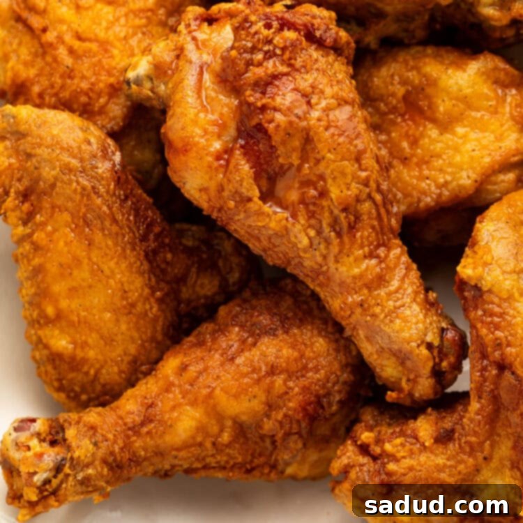 Close-up of crispy gluten-free fried chicken, ready to be served, capturing its inviting golden hue.