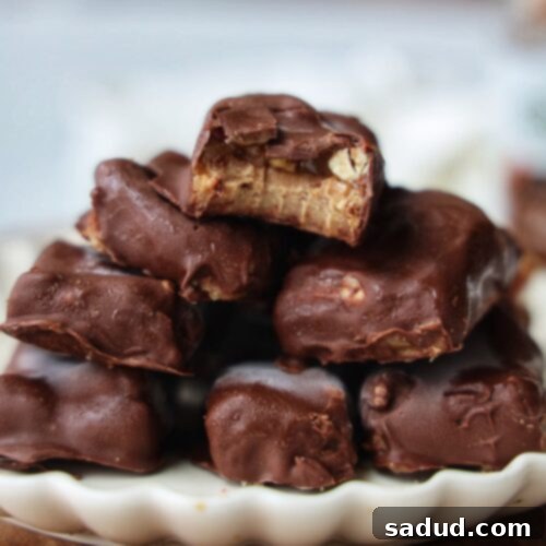 Healthier Pecan Snickers bars presented on a plate.