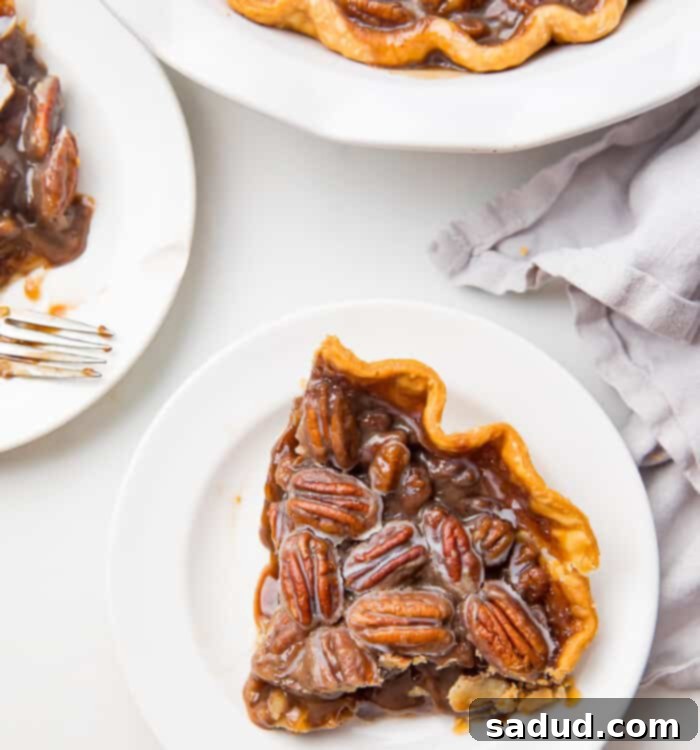 overhead shot of pecan pie with serving dish
