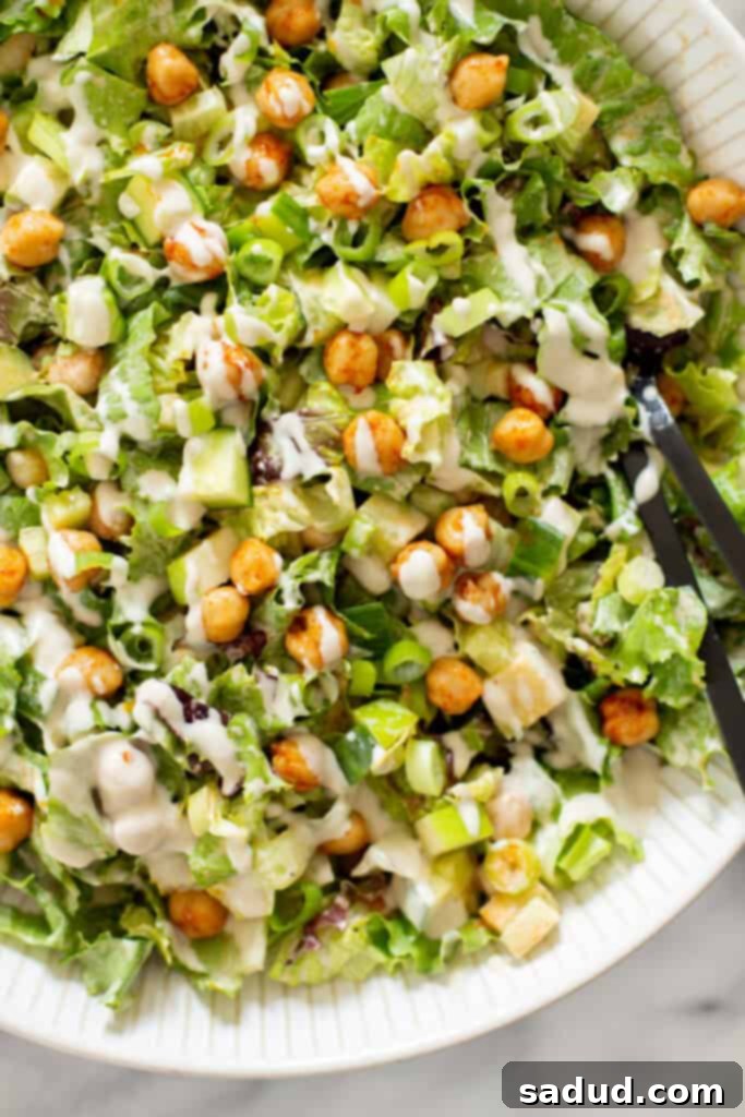 15 Vegetarian Dishes You'll Adore 10 closeup image of chickpea salad with tahini dressing