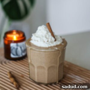 A high-protein vegan eggnog shake in a glass.