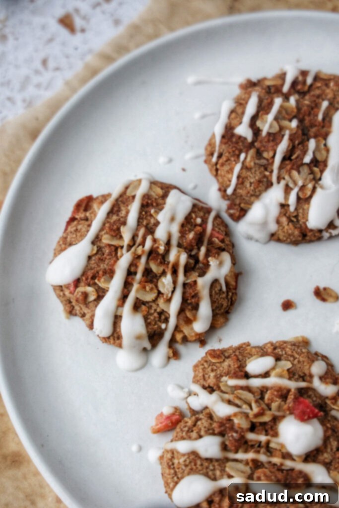 A plate of apple crisp cookies with glaze, beautifully arranged and ready to be enjoyed.